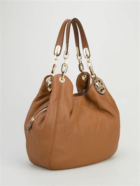 michael kors brown leather slouch bag adjustable buckle straps|Michael Kors purses under 50.